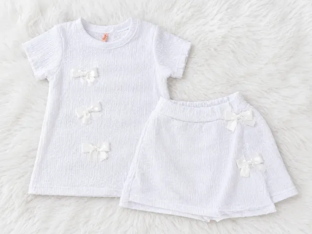 Conjunto de nena blanco con moños talle 12