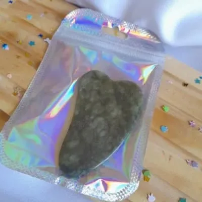 Piedra jade para masajes faciales