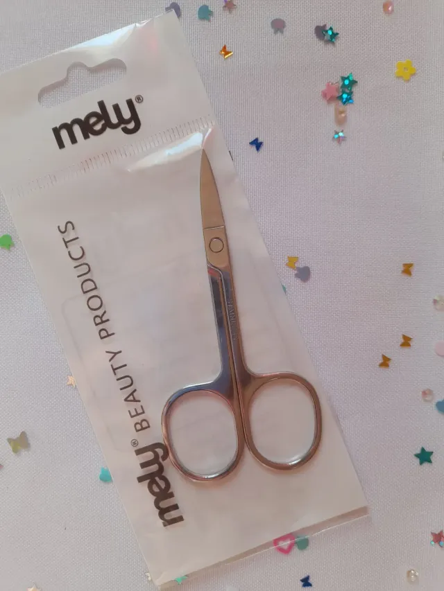 Mini tijera para uñas