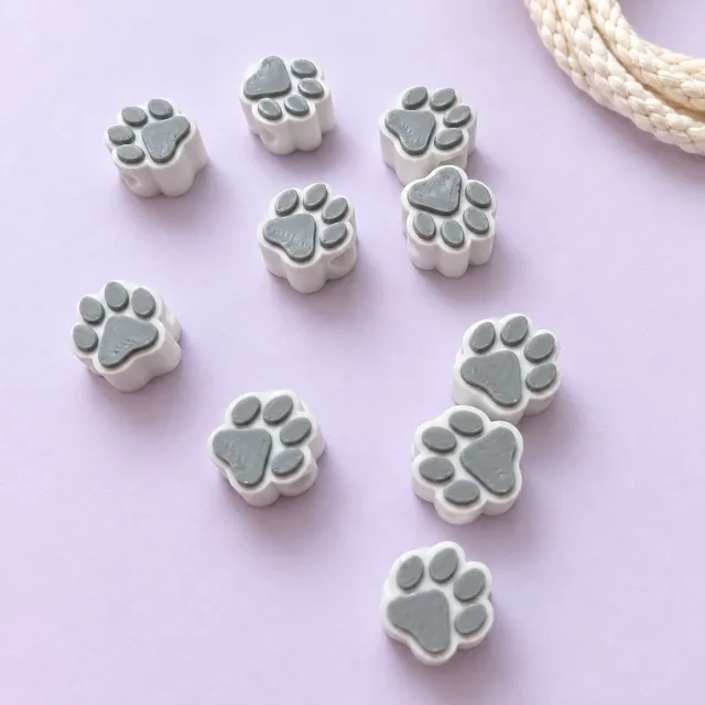 Charms Huellitas x 10u