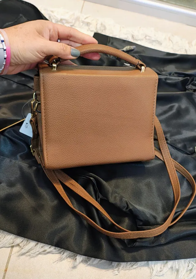 Cartera con tira regulable 5
