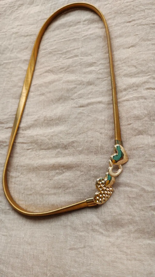 Cinturón elastizado dorado corazones