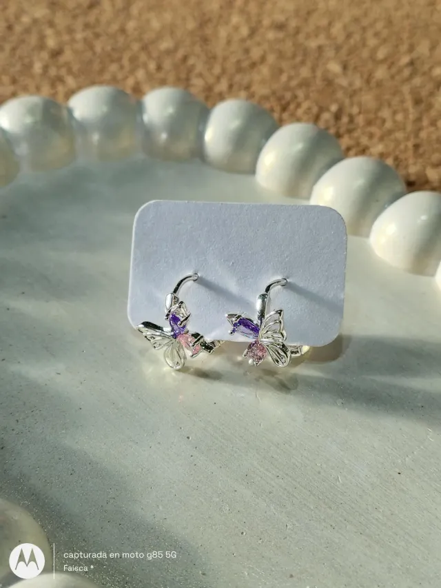 Aro mariposa acero blanco