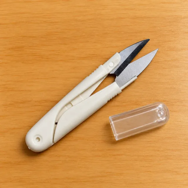 Cortahilachas con capuchón protector – Blanco